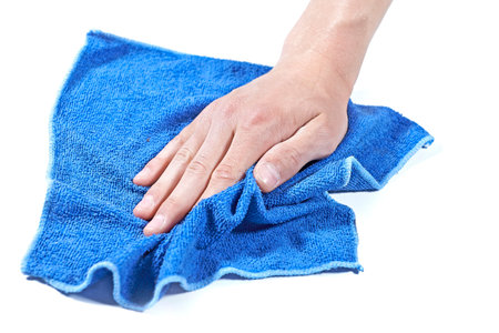 Cleaning surface with a blue microfiber cloth