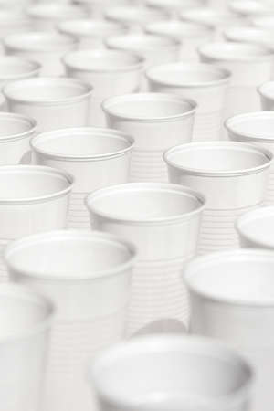 Endless rows of white plastic cupsの写真素材