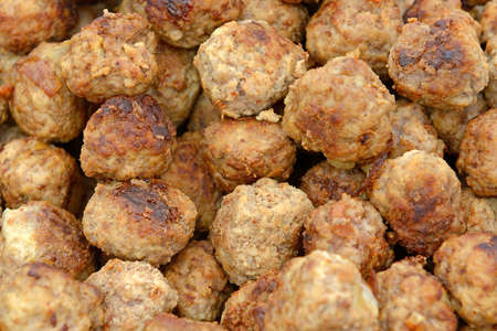 Closeup image of a pile of fried swedish meatballsの写真素材