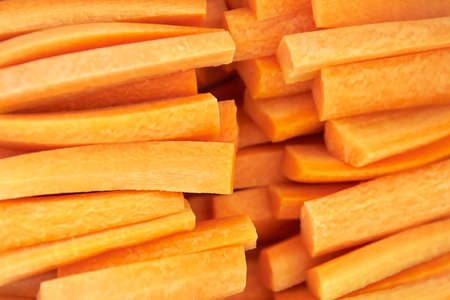 Closeup image of sliced carrots sticksの写真素材