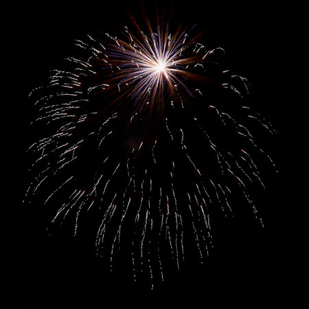 New years eve fireworks exploding in the sky at night