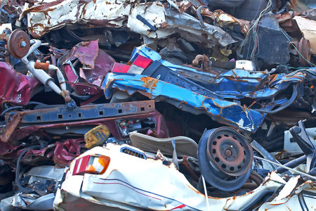 Junkyard metal in a big pile and different colors