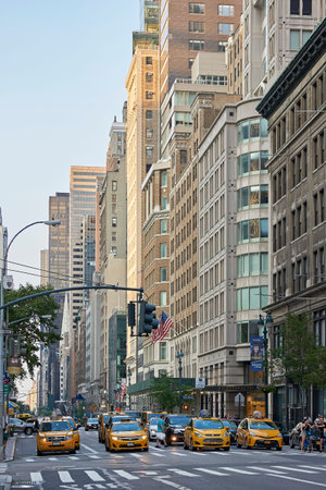 Streets of Manhattan, New York with blue skies in the background