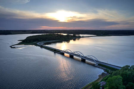 Aerial view of Munkholm bridge in Zealand, Denmark at sunsetの写真素材