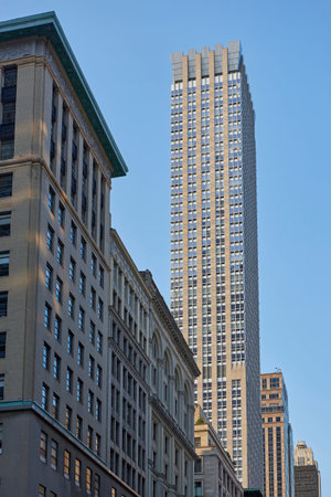 Manhattan skyscrapers in New York city with blue skies in the background