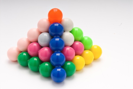 3D puzzle coloured balls pyramidの写真素材