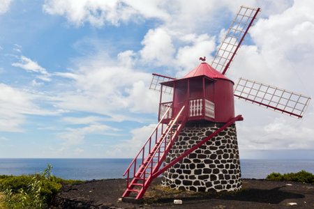 Backside of a red windmill on the Azores, Portugal