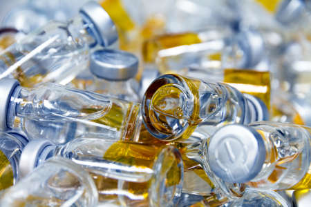 medicinal bottles on a pileの写真素材