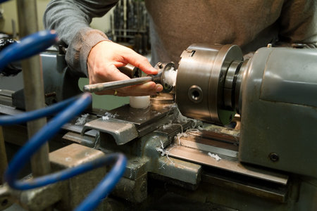 Man working on a lathe