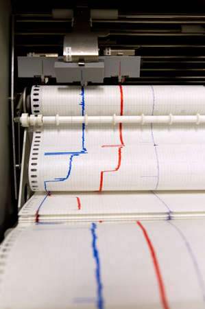 Paper comes out of an printing monitoring deviceの写真素材
