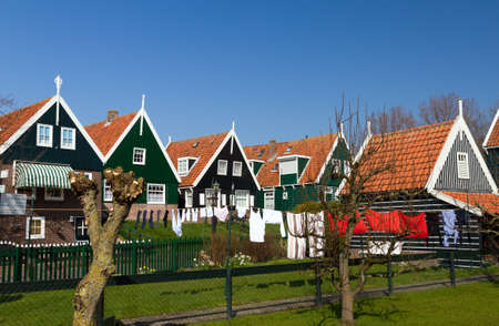 Traditional houses in the touristic town of Marken in the Netherlandsの写真素材