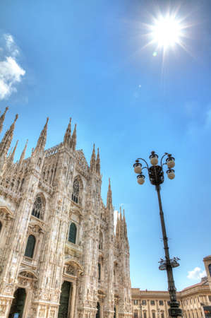 View into the sun at the Cathedral of Milan  HDRの写真素材