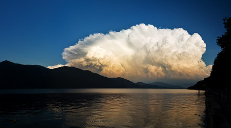 Approaching storm clouds at the lake  Photographed at the Lago Maggiore, Italyの写真素材