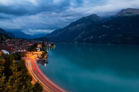 The town of Brienz situated at lake Brienz  Brienzersee  at twilightの写真素材