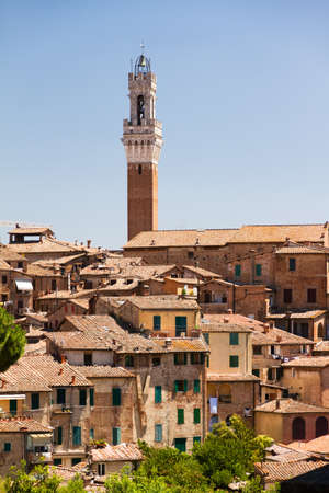 Cityscape of Siena with the Torre del Mangia, in Italyの写真素材