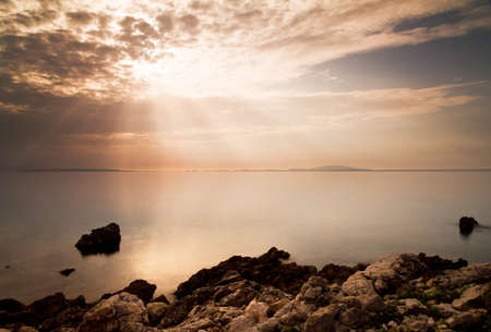 Long exposure coastline of Croatia at sunsetの写真素材