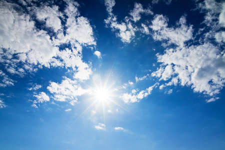 Beautiful sky with a nice cloudscape and bright sunの写真素材