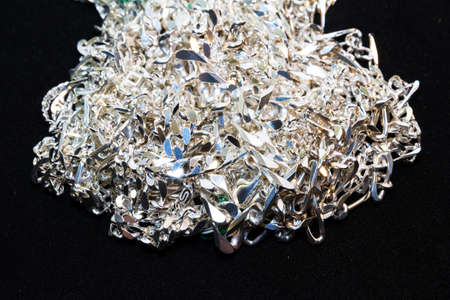 A bunch of silver chains on a pileの写真素材