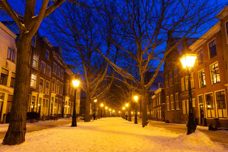 Hooglandsekerkgracht in Leiden at twilight in winter with snowの写真素材