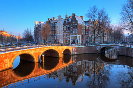 Beautiful early morning winter view on one of the  city canals of Amsterdam, The Netherlands  HDR のeditorial素材