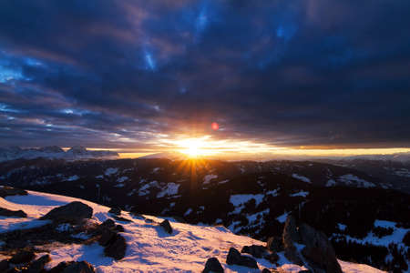 Beautiful sunset in the mountains of the Italian alpsの写真素材