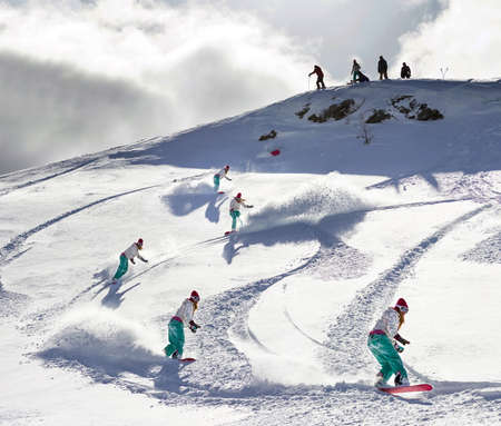 Female snowboarder freeriding in the backcountryの写真素材