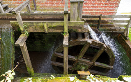 Ancient water wheel in actionの写真素材