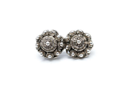Handcrafted antique brooch in the shape of a so-called  Zeeuwse knoop , a traditional dutch button jewel typeの写真素材