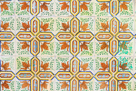 Close up image of the beautifully decorated tiles on the houses in the streets of Lisbon, Portugal