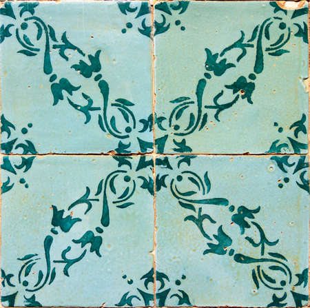 Close up image of the beautifully decorated tiles on the houses in the streets of Lisbon, Portugalの写真素材