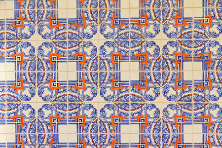 Close up image of the beautifully decorated tiles on the houses in the streets of Lisbon, Portugal