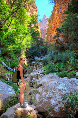 Beautiful woman standing in a canyon in Isalo national park in Madagascar  HDRの写真素材