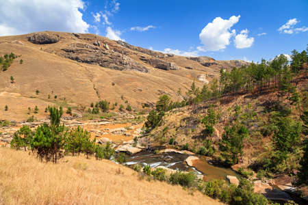 Beautiful landscape with a river and hills in Madagascarの写真素材