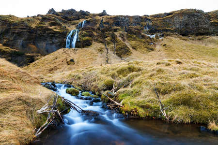 Beautiful view on a cascade near the Seljalandsfoss waterfall in Icelandの写真素材