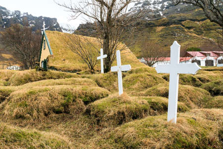 Beautiful old turf church and cemetery dating from 1883 in Hof, Icelandの写真素材