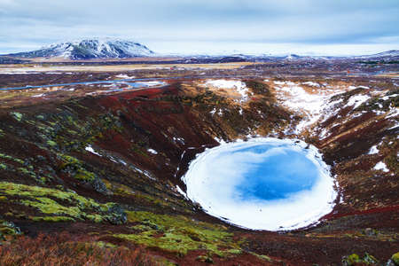 Kerid or Kerith volcanic crater lake on the touristic golden circle route in Iceland in winterの写真素材