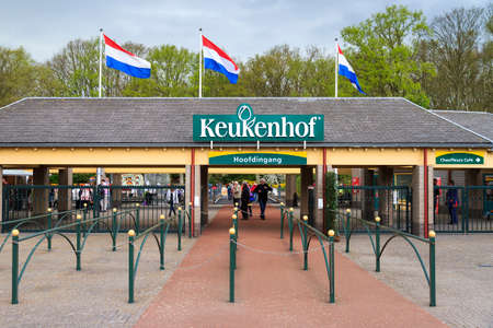 People at the entrance of the popular tourist destination the Keukenhof with beautiful flowers in spring in Lisse, the Netherlands, on april 7, 2014のeditorial素材