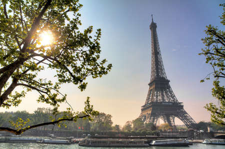 Beautiful backlit Eiffel tower in spring in Paris, Franceの写真素材