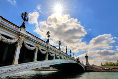 The Pont Alexandre III over the river Seine at Invalides in Paris, France, in springの写真素材