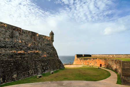 Beautiful view of the large outer wall with sentry box of fort San Cristobal in San Juan, Puerto...