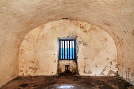 Empty room with a round ceiling and a window in Fort San Cristobal in San Juan, Puerto Ricoのeditorial素材