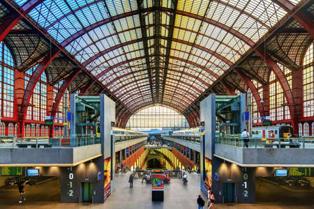 Tourists and commuters in the beautiful historic Antwerp Central Station in Antwerp, Belgium, on September 20, 2014のeditorial素材
