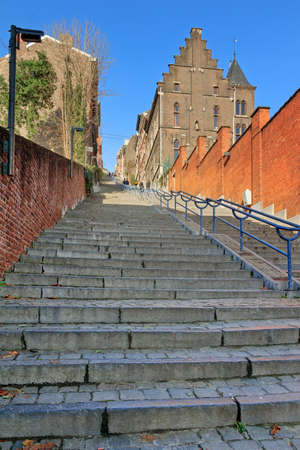 374-step long staircase Montagne de Bueren, a popular landmark and tourist attraction in Liege, Belgium, on a beautiful winter dayの写真素材