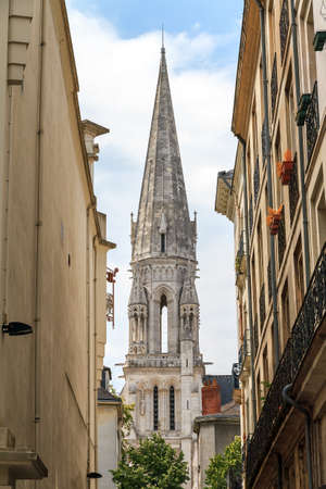 Beautiful cityscape view of the Basilique Saint-Nicolas de Nantes in the city of Nantes, France, on a summer day with cloudsの写真素材
