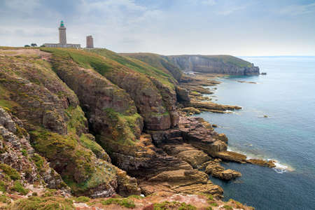 Beautiful landscape view of the coastline at Cap FrÃ©hel in Brittany, France, with its lighthouses and steep cliffs in summerの写真素材