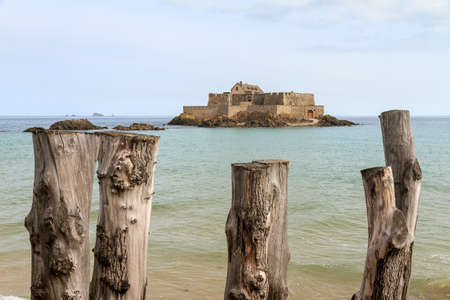 Beautiful view of tidal island Fort National at high tide in Saint-Malo, Brittany, France, a national heritage monumentの写真素材