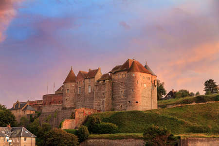 Beautiful view of Ch?teau de Dieppe at sunset in Normandy, France, with a vibrant sunset skyのeditorial素材