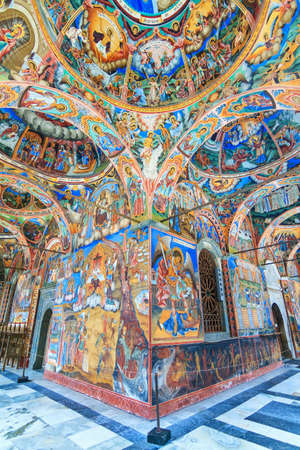 Beautiful view of the vibrant decoration of the Orthodox Rila Monastery, a famous tourist attraction and cultural heritage monument in the Rila Nature Park mountains in Bulgariaのeditorial素材