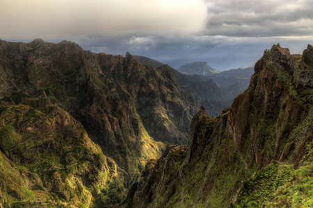 Beautiful panorama view of Pico Ruivo on a cloudy summer dayの写真素材