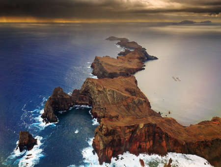 Beautiful dramatic aerial landscape panorama of the island Madeira from Ponta de Sao Lourenco nature reserve at sunriseの写真素材